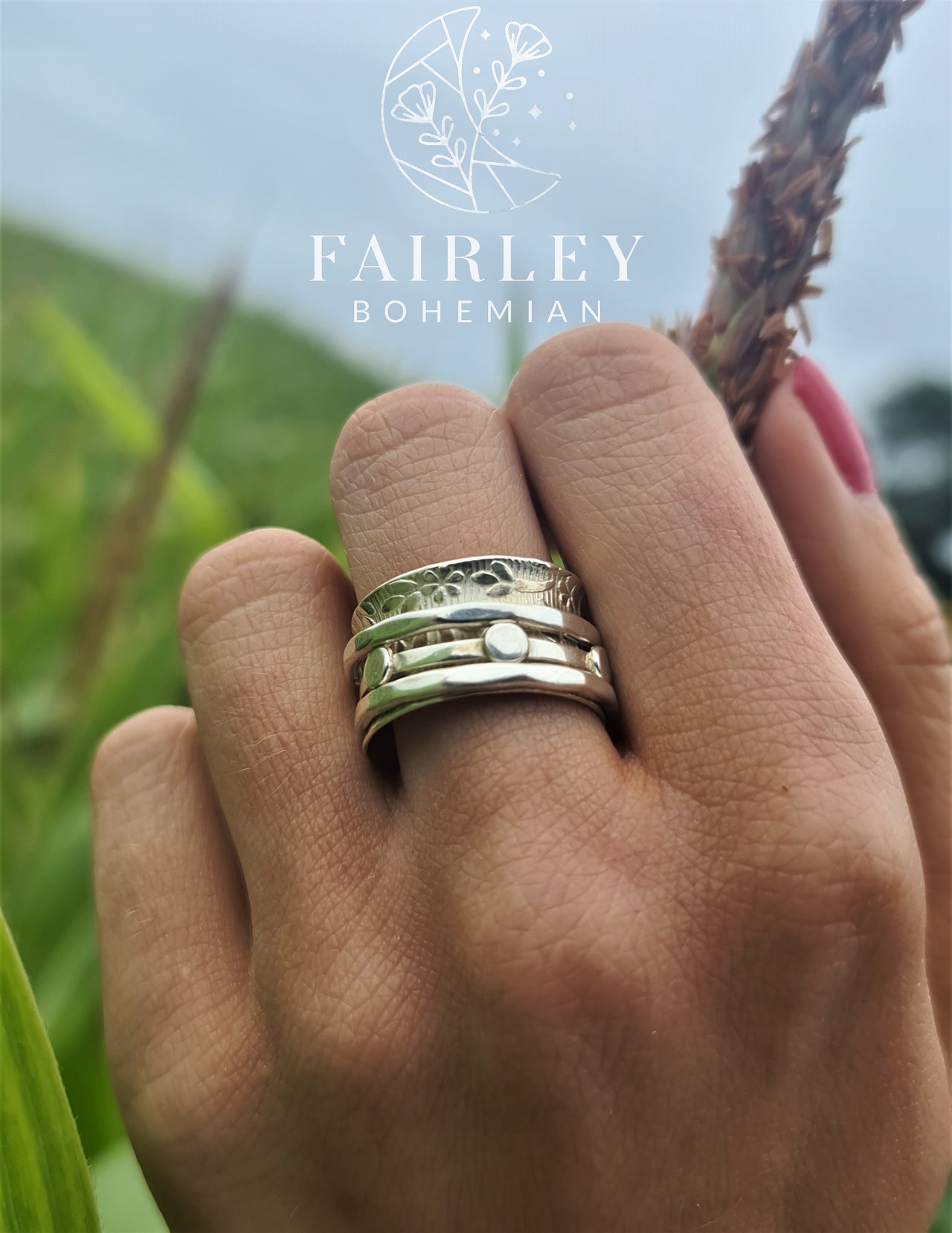bohemian spinner ring anxiety fidget worry ring in solid sterling silver on hand model jungle