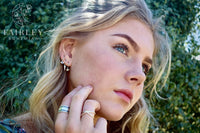 Thumbnail for set of 3 huggie hoops bohemian earrings model wearing earrings and rings