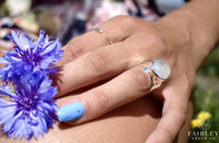 Thumbnail for moonstone and arrow ring on hand model